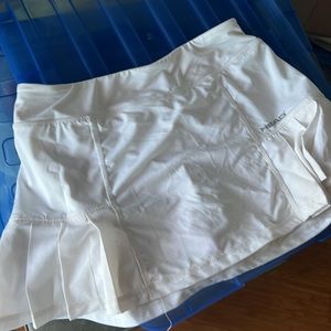 Head pleated tennis skort